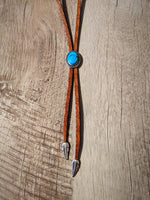 Embossed Light Brown Leather Royston Turquoise Chupacabra Bolo